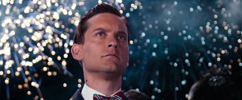 Movie still from “The Great Gatsby” (2013), directed by Baz Luhrmann – A person wearing a suit and bow tie; Close Up shot, Low angle