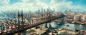 Movie still from “The Great Gatsby” (2013), directed by Baz Luhrmann – An aerial view of a city with a bridge crossing over it; Extreme Wide shot, High angle