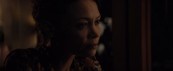 Movie still from “All the Old Knives” (2022), directed by Janus Metz – A person looking at the camera; Close Up shot, Over the shoulder angle