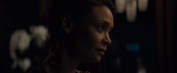 Movie still from “All the Old Knives” (2022), directed by Janus Metz – A person looking to the side; Close Up shot, Over the shoulder angle