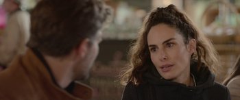 Movie still from “All the Places” (2023), directed by Pitipol Ybarra – A man and a woman talking to each other; Close Up shot, Over the shoulder angle