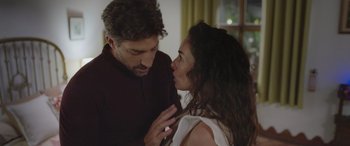 Movie still from “All the Places” (2023), directed by Pitipol Ybarra – A man and a woman are looking at one another; Close Up shot, Over the shoulder angle