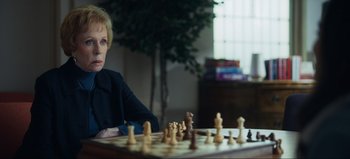 Movie still from “All Together Now” (2020), directed by Brett Haley – An older woman sitting in front of a chessboard; Close Up shot, Over the shoulder angle