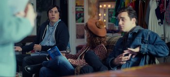 Movie still from “All Together Now” (2020), directed by Brett Haley – A group of people sitting in a room; Medium shot, Over the shoulder angle