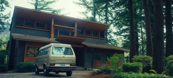 Movie still from “All Together Now” (2020), directed by Brett Haley – A van is parked in front of a house; Extreme Wide shot, Low angle