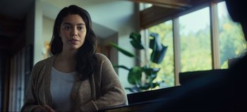 Movie still from “All Together Now” (2020), directed by Brett Haley – A woman sitting in front of a computer desk; Close Up shot, Low angle