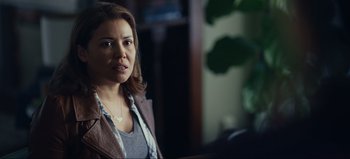 Movie still from “All Together Now” (2020), directed by Brett Haley – A person wearing a leather jacket; Close Up shot, Over the shoulder angle