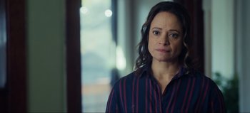 Movie still from “All Together Now” (2020), directed by Brett Haley – A person wearing a striped shirt; Close Up shot, Over the shoulder angle