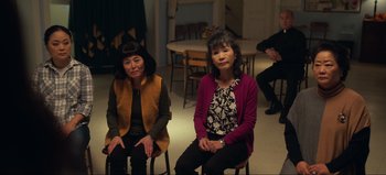 Movie still from “All Together Now” (2020), directed by Brett Haley – Two older women sitting on chairs in a room; Medium shot, High angle