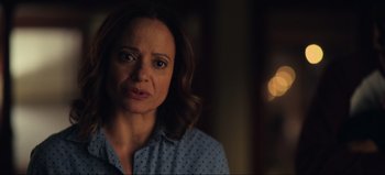 Movie still from “All Together Now” (2020), directed by Brett Haley – A person wearing a blue shirt; Close Up shot, Over the shoulder angle