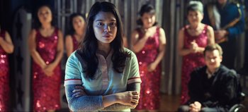 Movie still from “All Together Now” (2020), directed by Brett Haley – A woman standing in front of two other women; Medium shot, Over the shoulder angle