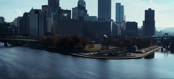 Movie still from “All Together Now” (2020), directed by Brett Haley – A view of a city from across the water; Extreme Wide shot, High angle