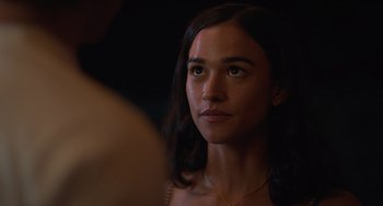 Movie still from “Along for the Ride” (2022), directed by Sofia Alvarez – A person looking at the camera; Close Up shot, Over the shoulder angle