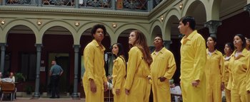 Movie still from “American Carnage” (2022), directed by Diego Hallivis – A group of young people standing next to each other; Wide shot, Low angle