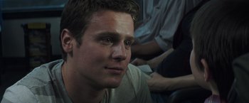 Movie still from “American Sniper” (2014), directed by Clint Eastwood – A person looking at the camera; Close Up shot, Over the shoulder angle