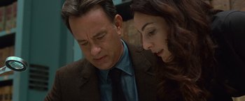 Movie still from “Angels & Demons” (2009), directed by Ron Howard – A man and a woman looking at one another; Close Up shot, Over the shoulder angle