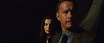 Movie still from “Angels & Demons” (2009), directed by Ron Howard – A man and a woman standing next to each other in the dark; Close Up shot, Low angle