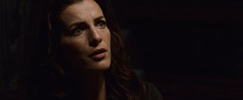 Movie still from “Angels & Demons” (2009), directed by Ron Howard – A person with long dark hair; Close Up shot, Low angle