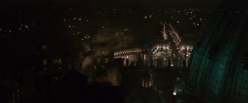 Movie still from “Angels & Demons” (2009), directed by Ron Howard – A view of a city at night from a high vantage point; Extreme Wide shot, High angle