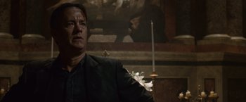 Movie still from “Angels & Demons” (2009), directed by Ron Howard – A man in a black jacket is looking into the distance; Close Up shot, Low angle