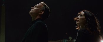 Movie still from “Angels & Demons” (2009), directed by Ron Howard – A man in a black shirt is looking up; Close Up shot, Low angle