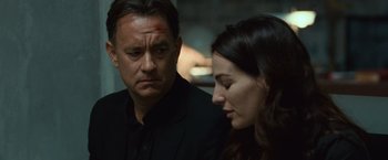 Movie still from “Angels & Demons” (2009), directed by Ron Howard – A man and a woman looking at one another; Close Up shot, Over the shoulder angle