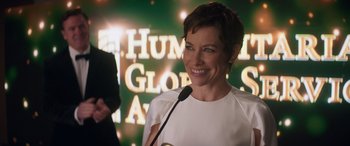 Movie still from “Ant-Man and the Wasp: Quantumania” (2023), directed by Peyton Reed – A woman standing in front of a microphone at an award ceremony; Close Up shot, Over the shoulder angle