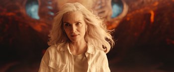 Movie still from “Ant-Man and the Wasp: Quantumania” (2023), directed by Peyton Reed – A woman with long white hair is posing for a picture; Close Up shot, Over the shoulder angle