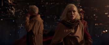 Movie still from “Ant-Man and the Wasp: Quantumania” (2023), directed by Peyton Reed – A woman in a brown coat and a man in a brown jacket; Medium shot, Over the shoulder angle