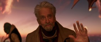 Movie still from “Ant-Man and the Wasp: Quantumania” (2023), directed by Peyton Reed – An older man with a beard and a mustache; Close Up shot, Over the shoulder angle