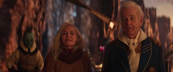 Movie still from “Ant-Man and the Wasp: Quantumania” (2023), directed by Peyton Reed – A woman standing next to another woman in front of a wall; Medium shot, Over the shoulder angle