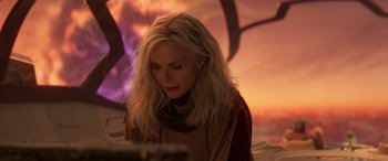 Movie still from “Ant-Man and the Wasp: Quantumania” (2023), directed by Peyton Reed – A woman is looking down at a piece of paper; Close Up shot, Over the shoulder angle