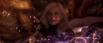 Movie still from “Ant-Man and the Wasp: Quantumania” (2023), directed by Peyton Reed – A blonde woman is holding her hand out to the camera; Close Up shot, Over the shoulder angle