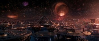 Movie still from “Ant-Man and the Wasp: Quantumania” (2023), directed by Peyton Reed – An image of an alien city in the middle of the night; Extreme Wide shot, High angle
