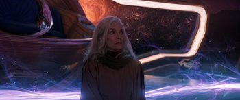 Movie still from “Ant-Man and the Wasp: Quantumania” (2023), directed by Peyton Reed – A woman standing in front of a space background; Close Up shot, Low angle