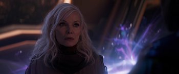Movie still from “Ant-Man and the Wasp: Quantumania” (2023), directed by Peyton Reed – A person with long white hair; Close Up shot, Over the shoulder angle