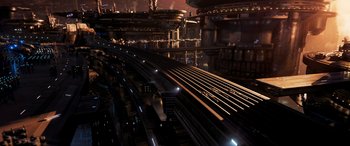 Movie still from “Ant-Man and the Wasp: Quantumania” (2023), directed by Peyton Reed – An overhead view of a train station at night; Extreme Wide shot, High angle