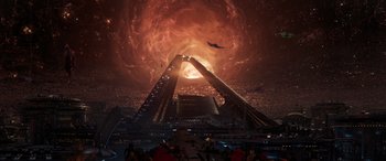 Movie still from “Ant-Man and the Wasp: Quantumania” (2023), directed by Peyton Reed – An image of an escalator going up to the top of a building; Extreme Wide shot, High angle