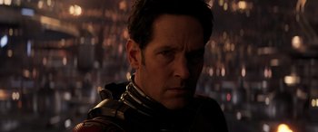 Movie still from “Ant-Man and the Wasp: Quantumania” (2023), directed by Peyton Reed – A person wearing a helmet; Close Up shot, Over the shoulder angle