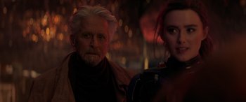 Movie still from “Ant-Man and the Wasp: Quantumania” (2023), directed by Peyton Reed – An older man and a young woman standing next to each other; Close Up shot, Over the shoulder angle