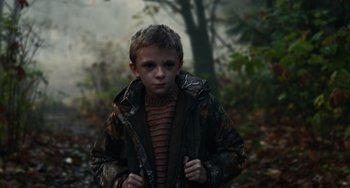 Movie still from “Antlers” (2021), directed by Scott Cooper – Medium shot, High angle