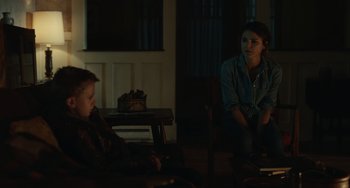 Movie still from “Antlers” (2021), directed by Scott Cooper – Medium shot, Over the shoulder angle