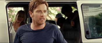 Movie still from “The Impossible” (2012), directed by J.A. Bayona – Ewan mcgregor in a car; Close Up shot, Over the shoulder angle