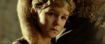 Movie still from “The Impossible” (2012), directed by J.A. Bayona – A young boy's face; Close Up shot, Over the shoulder angle