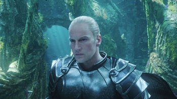 Movie still from “Aquaman” (2018), directed by James Wan – A person wearing a suit of armor; Close Up shot, High angle