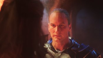 Movie still from “Aquaman” (2018), directed by James Wan – A person wearing a helmet; Close Up shot, Over the shoulder angle