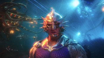 Movie still from “Aquaman” (2018), directed by James Wan – A man with a metal helmet on his head; Close Up shot, Low angle