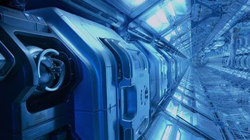 Movie still from “Avatar” (2009), directed by James Cameron – A train is shown inside of a train station; Extreme Wide shot, Low angle