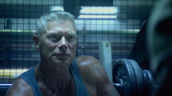 Movie still from “Avatar” (2009), directed by James Cameron – A person in a gym; Close Up shot, Low angle