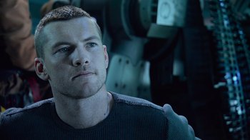 Movie still from “Avatar” (2009), directed by James Cameron – A person wearing a black shirt; Close Up shot, Low angle